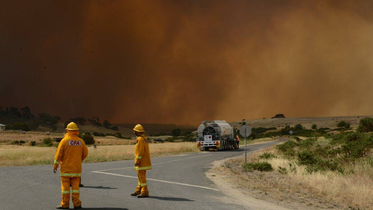 Firefighters at the scene of the Chepstowe grassfire. PICTURE: ADAM TRAFFORD
