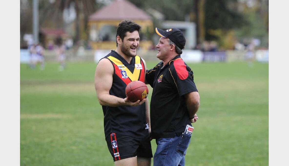 Brendan Fevola and Doug Hawkins enjoy a laugh before the game. PICTURE: SHAWN SMITS