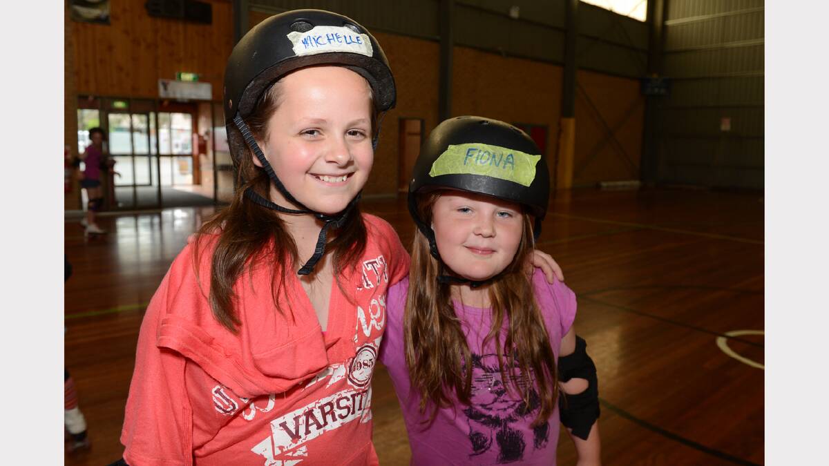 Casey Gogliotti, 9, Delacombe and Phoebe Porter, 9 at the school holidays fun skate session at the Doug Deans Sports Stadium. PICTURE: KATE HEALY. 