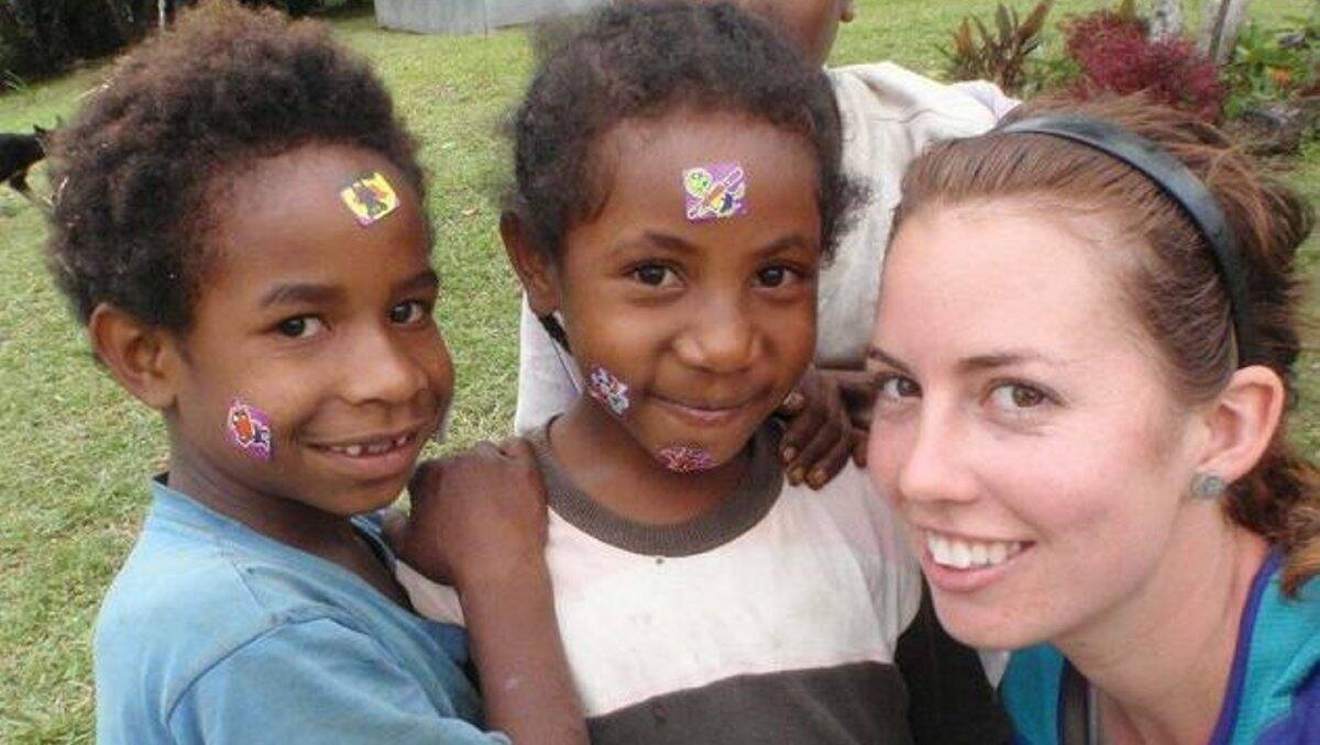 Megan Fraumano, of Ballarat, with some young PNG children.
