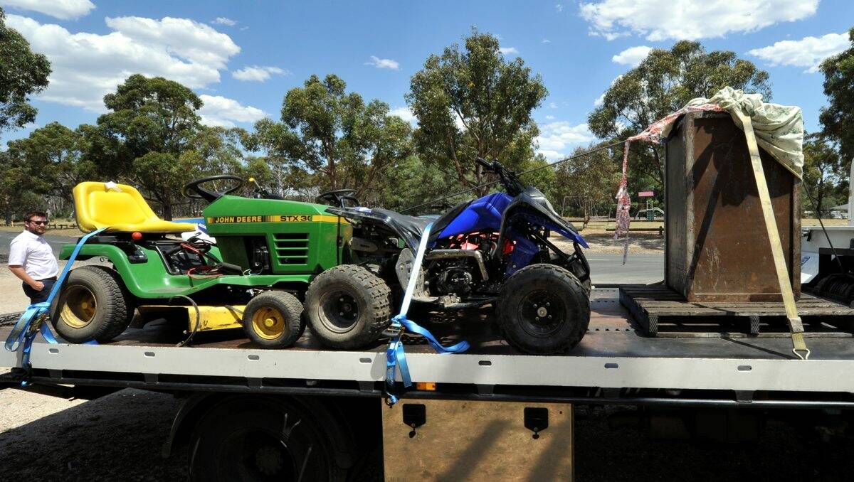 Police raided a property in Spencer Street, Canadian. They seizes stolen cars, a flat bed tow truck and caravan, quad bikes, a mini-bike and ride-on mower and a safe.