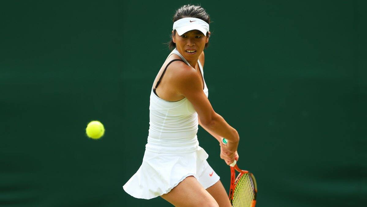 Su-Wei Hsieh of Taipei plays a backhand during her Ladies' Singles second round match against Alize Cornet of France.