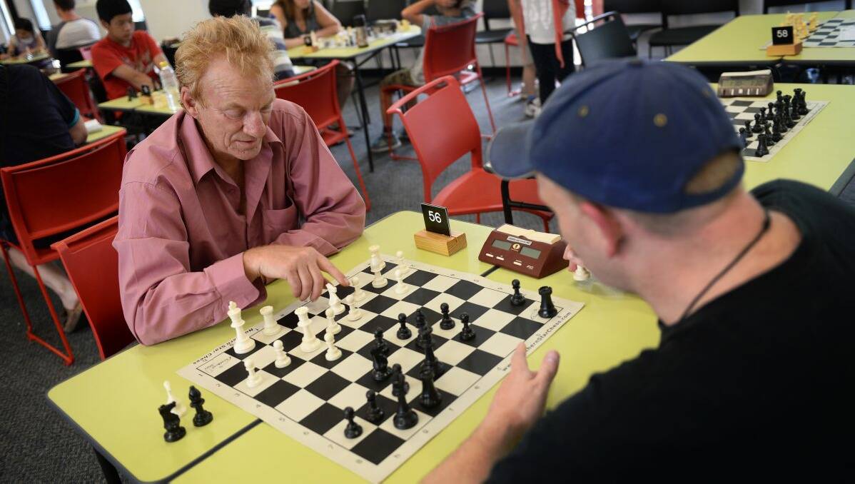 Pat Cook playing Rob Bailey at the Begonia Open Chess Competition. 