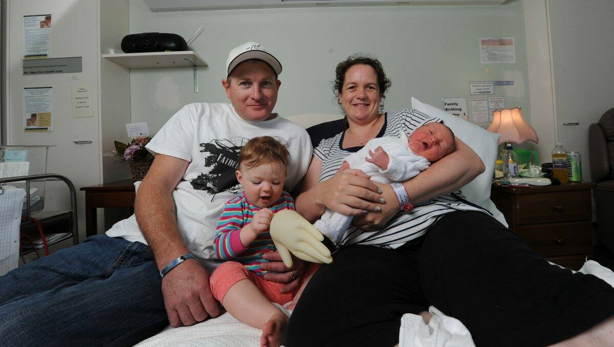 Grant, Adrienne and Eva Smith, 1, with newborn Kayden.