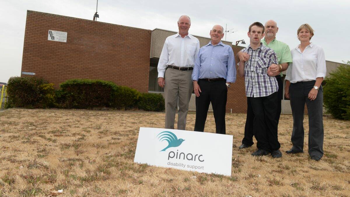 Craig Coltman, Doug Kimberley, Liam Styles, Leo Styles and Sara Cavanagh at Pinarc's new premises.
