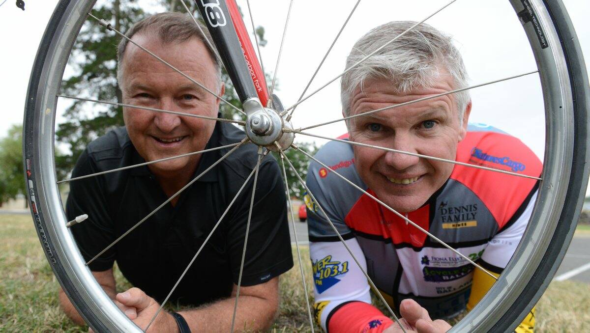 Patron: Cycle Classic committee member Gavin James and event patron Danny Frawley get set for the annual event yesterday. PICTURE: KATE HEALY