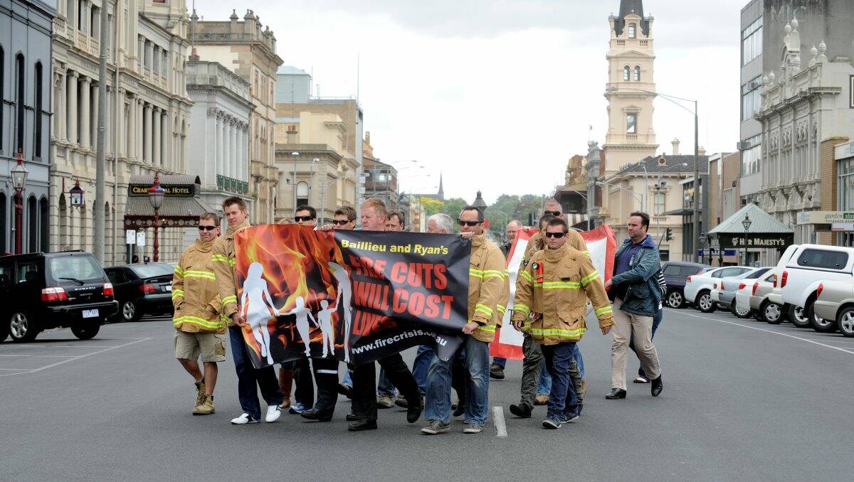 Angry firefighters took to the streets of Ballarat yesterday in protest against funding cuts they claim are stopping them from doing their job. PICTURE: JEREMY BANNISTER