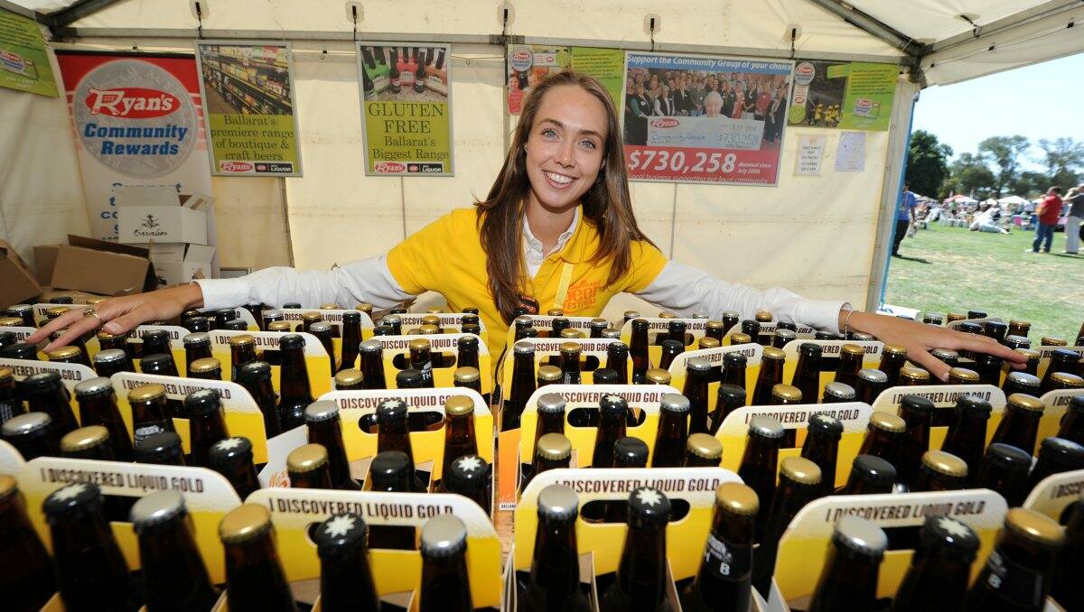 Penny Elizabeth shows the variety of beers on offer.  PICTURE: JUSTIN WHITELOCK