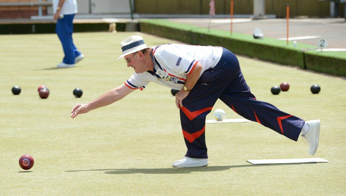 Bill Wilkins of Central Wendouree sends down a shot during day one of the Central Wendouree Classic Pairs bowls tournament yesterday. The tournament concludes today. PICTURE: ADAM TRAFFORD
