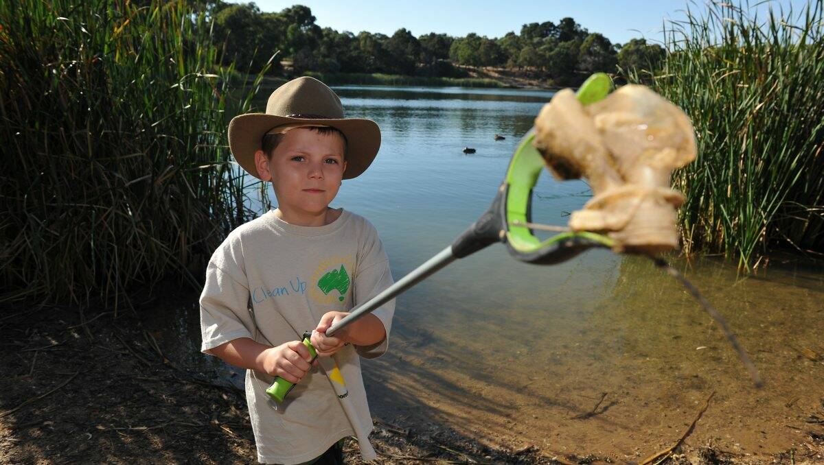 Dedicated: Ashley Straga, 5, has signed on for Clean Up Australia Day after concern about rubbish at Lake Esmond. PICTURE: LACHLAN BENCE