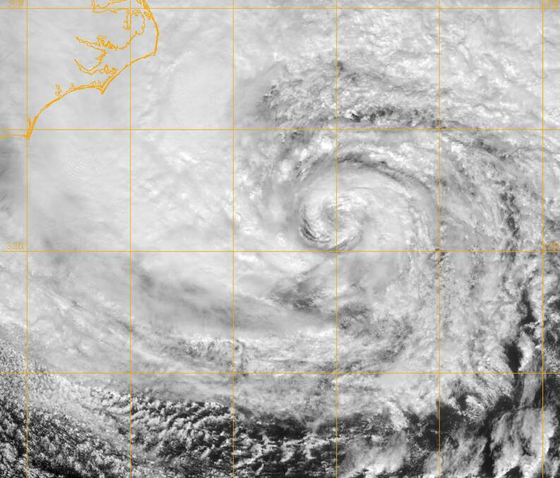 GOES-13 satellite image by the US Naval Research Laboratory shows the eye of Hurricane Sandy it churns just off the eastern coast of the US. 