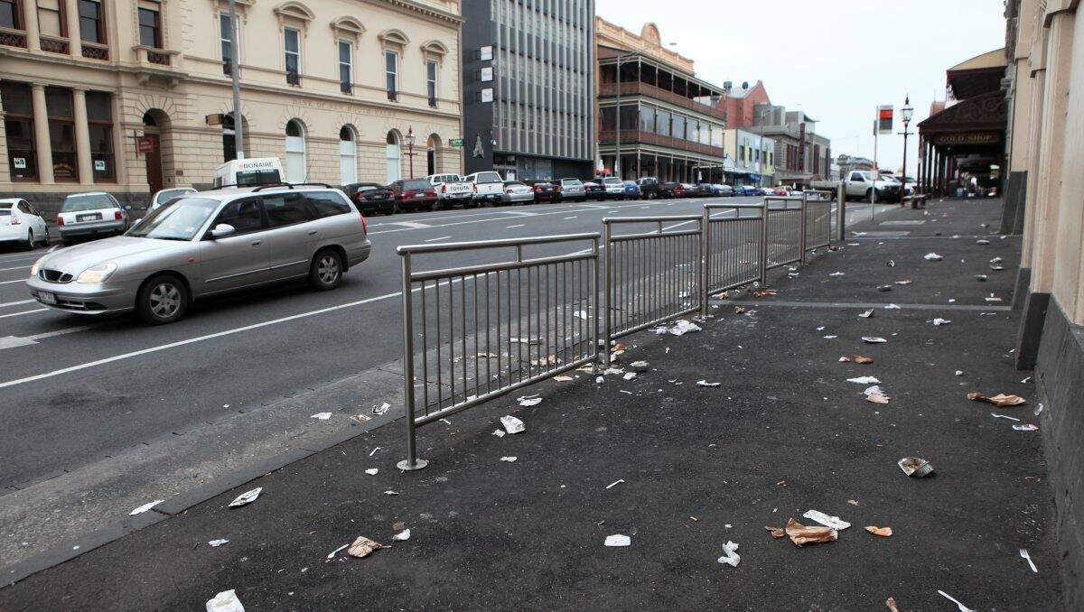  Litter left at the Lydiard Street North taxi rank by late-night revellers.
