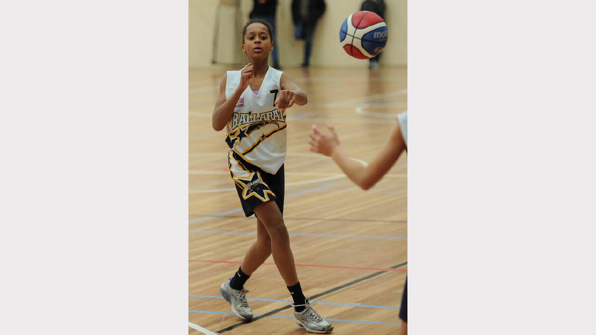 Junior Basketball Tournament - Ballarat Gold (white) V Collingwood 1 (black) 14GA1. @ Arch Complex Court 8. L-R - Claudia Plange - ballarat