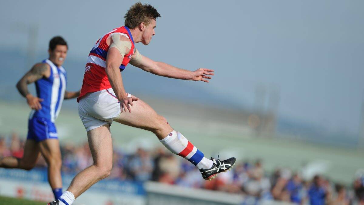 Western Bulldogs defender and former Ballarat youngster Jordan Roughead in full flight against North Melbourne in an NAB Cup match  at Eureka Stadium last year. 