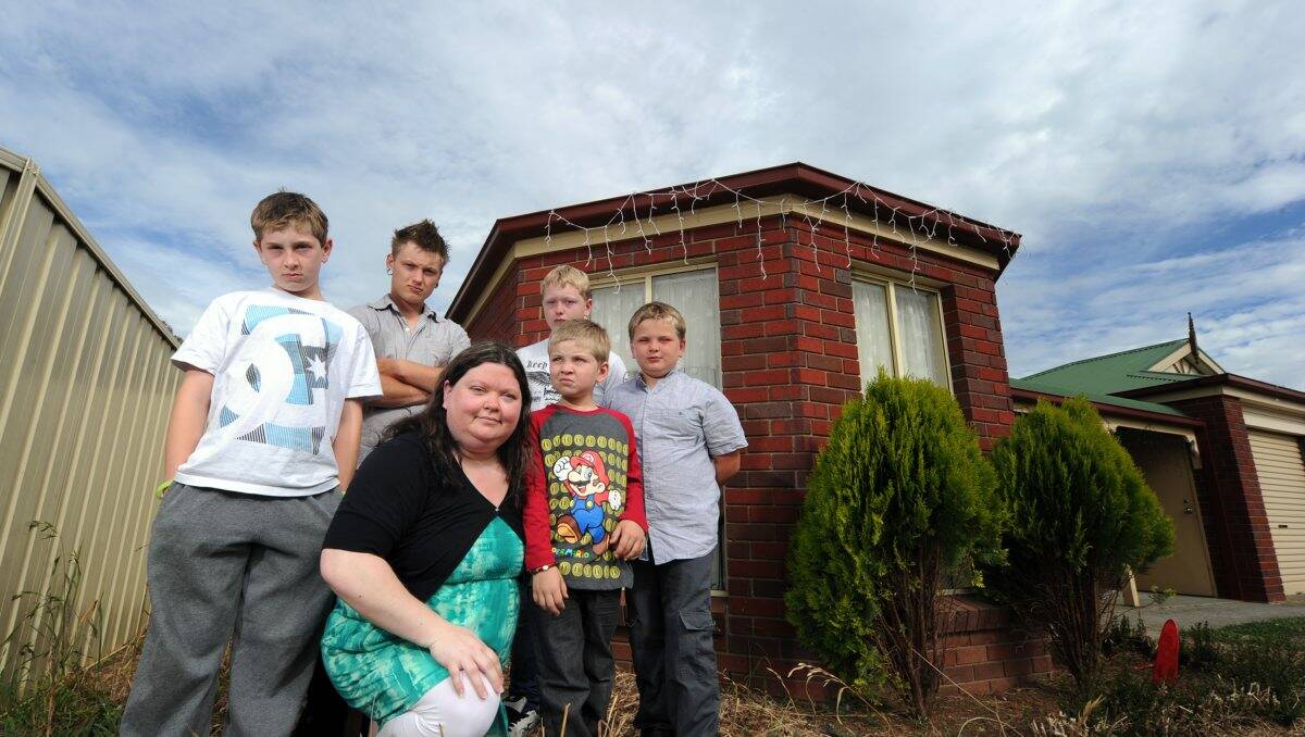 Tamii Stapleton and her sons Kaylan, Dylan, Jordan, Jaylan and Rhylan, are devastated that their Christmas decorations have been stolen from their front yard. PICTURE: JUSTIN WHITELOCK