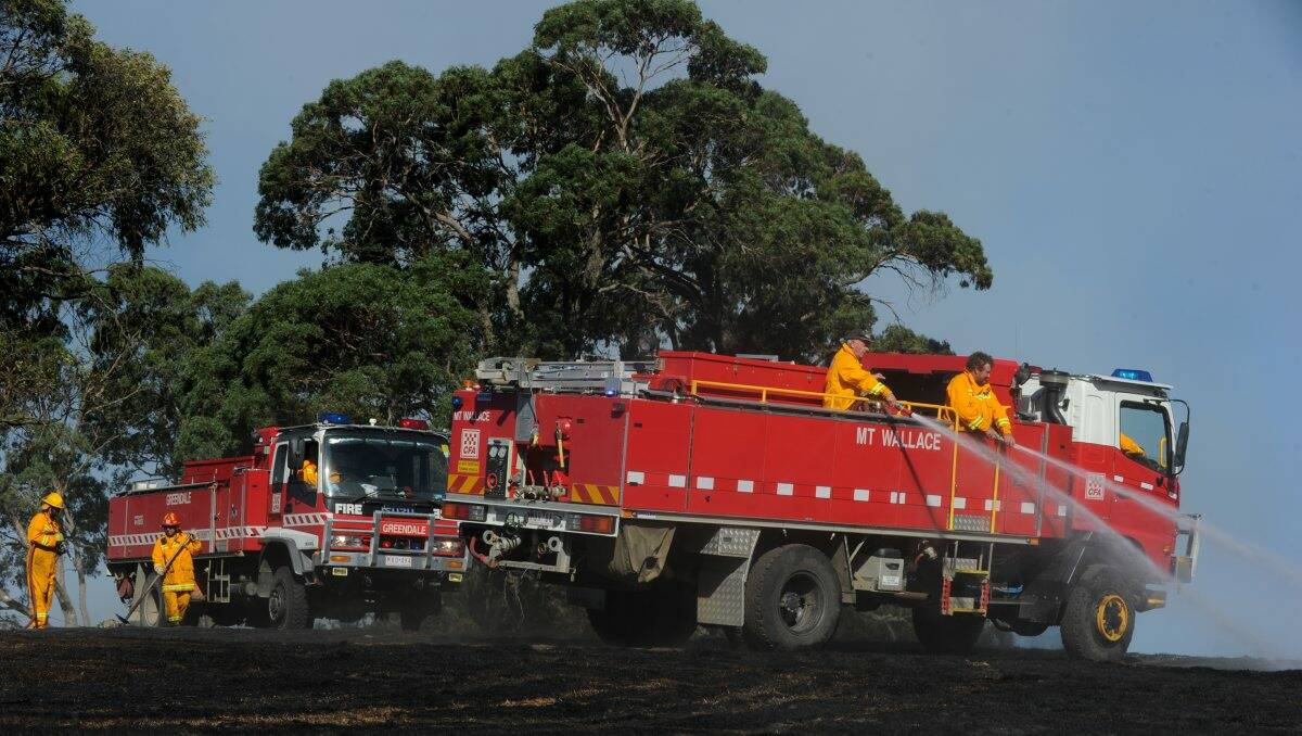 Nearly 60 trucks and five aircraft worked to controlled the blaze, which started near the Creswick Forest. PICTURES: JUSTIN WHITELOCK