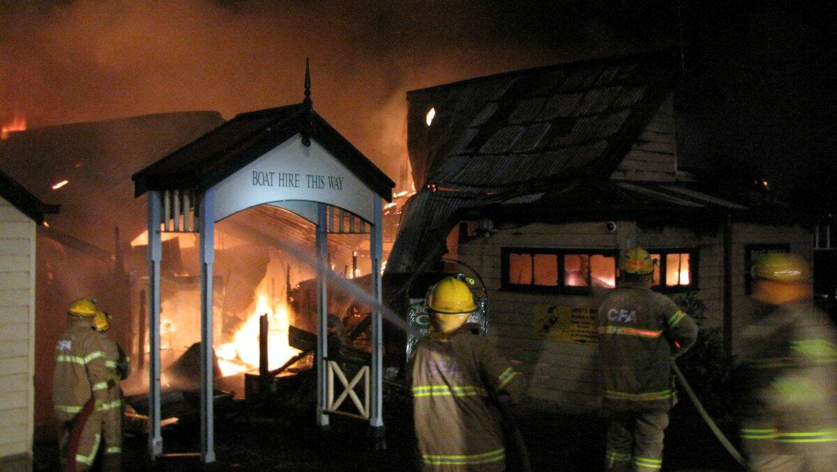 Cafe burns: Firefighters work to contain the blaze at the Boat House Cafe on Saturday night. PICTURE: CFA 