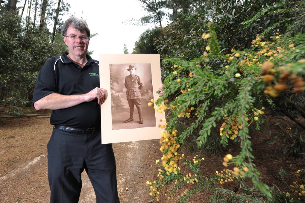 Andrew Wallace with a picture of his grandfather James Wallace. Mr Wallace has found out that his grandfather, a World War I veteran, was raised in the Ballarat Orphanage. PICTURE: JUSTIN WHITELOCK