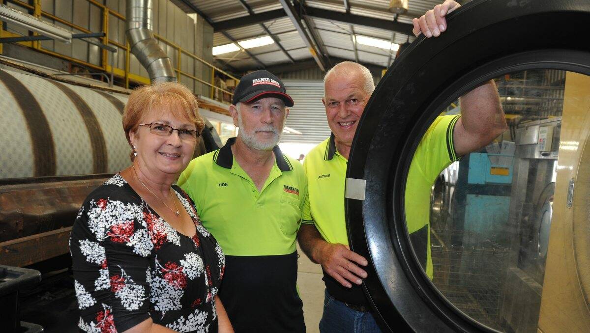 Staff retiring at Palmer Brothers laundry service. From left, retiring after 36 years Joan Bridges, retiring after 32 Years Don Kay, retiring after 36 Arthur Bridges. PICTURE: Lachlan Bence