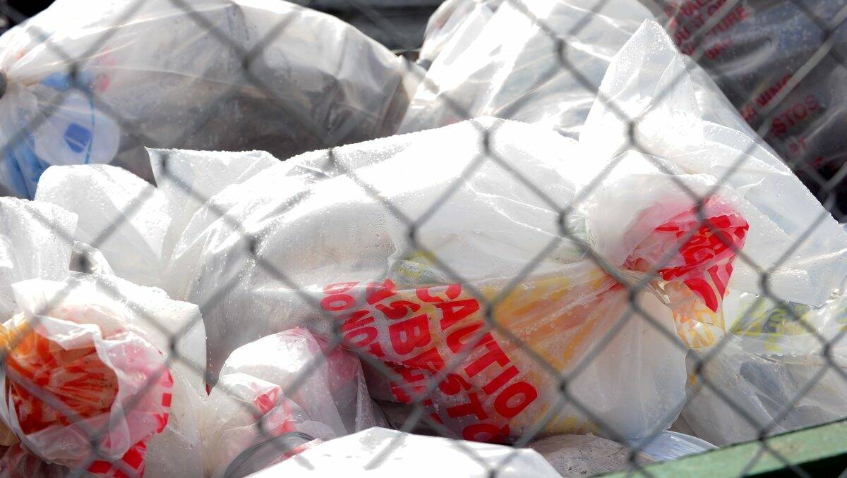 Bagged asbestos in a rubbish skip in Ballarat. PICTURE: THE COURIER