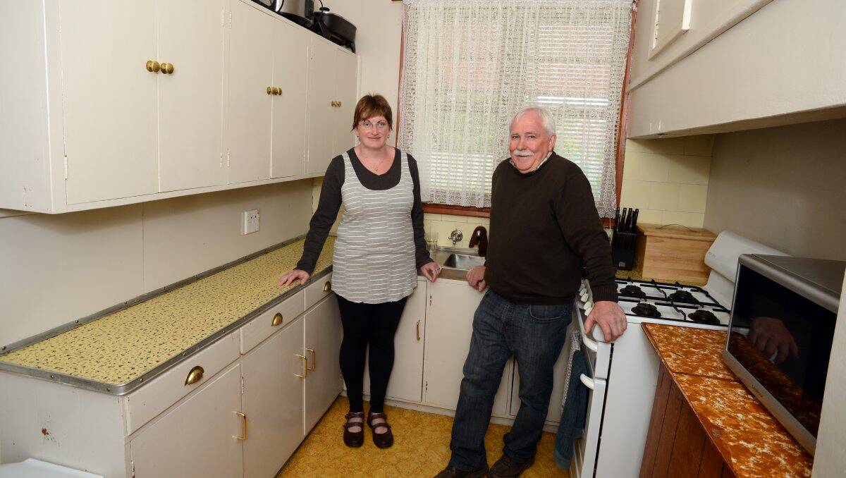 Finalist Tegan Johnson and Malcolm Alexander of Realistic Kitchens in Ms Johnson's kitchen yesterday.
