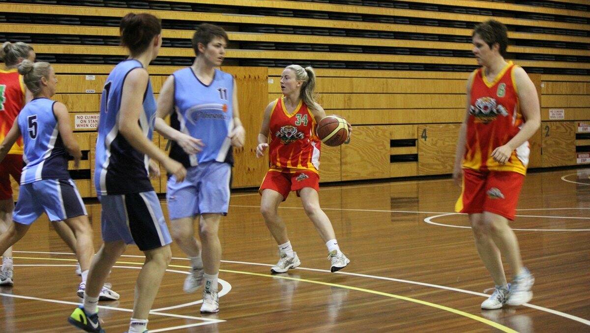 Celtic Tigers Green's Prue Scott tries to spark a comeback for her team during the clash against Phoenix.