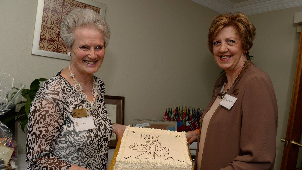 CELEBRATING: Charter president Val Sarah and Zonta president Donna Campbell with the cake to celebrate 35 years of service to local and global communities. PICTURE: KATE HEALY
