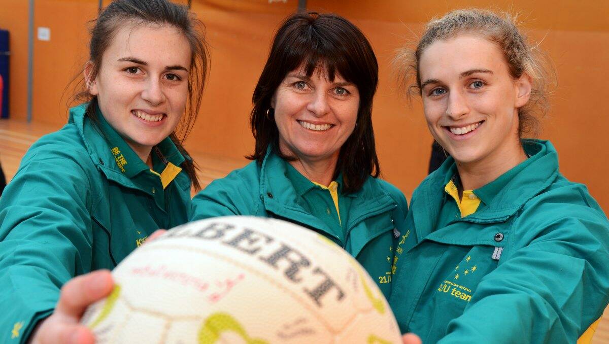 New Team: Australia 21/under netball team captain Maddy Proud, left, coach Carol Byers and vice-captain Gabi Simpson. The leadership roles for Proud and Simpson were announced yesterday at a coaching clinic at Buninyong Primary School. PICTURE: KATE HEALY