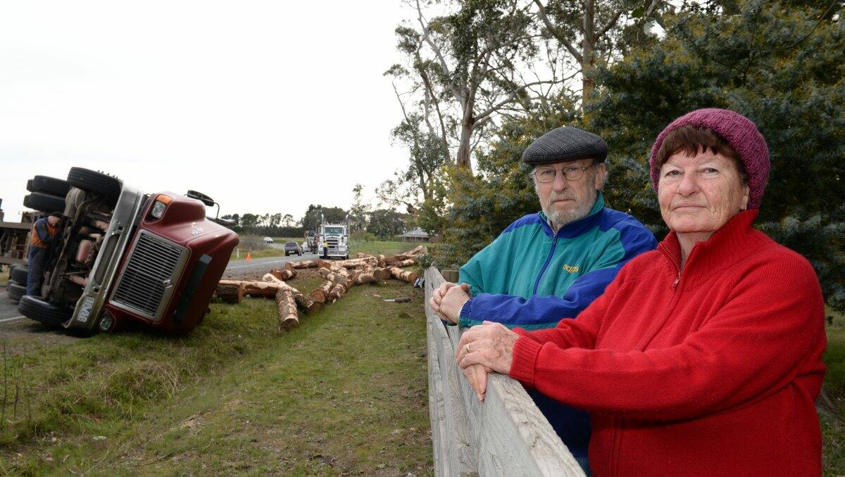 TROUBLE SPOT: Ballarat-Colac Road residents Kevin and Colleen Rowlands have asked VicRoads to take urgent action after a logging truck rolled over at Enfield. PICTURE: KATE HEALY