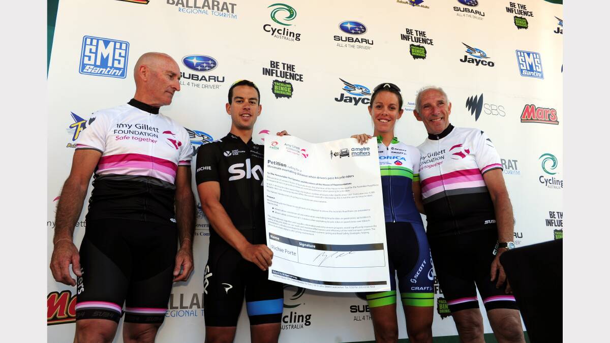 Simon Gillett, Richie Porte, Jessie McLean and Phil Liggett at the signing.