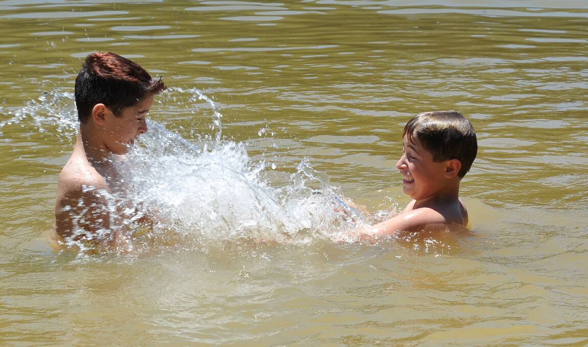 Lachlan and Taylor Scickra enjoy the water at Creswick’s St Georges Lake.