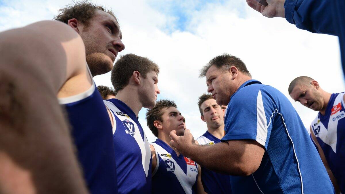 IN CHARGE: Sunbury coach Rick Horwood addressing his players during this year’s grand final. PICTURE: ADAM TRAFFORD
