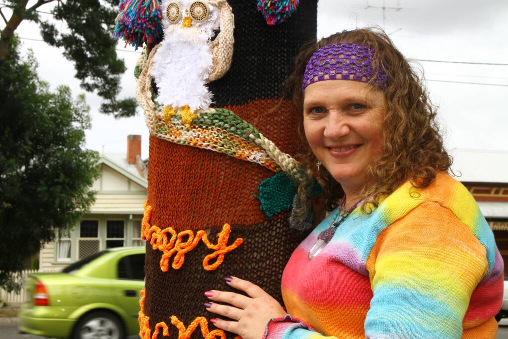 Local artist Shellabelle O’Connor knitted the telephone pole art in six months.