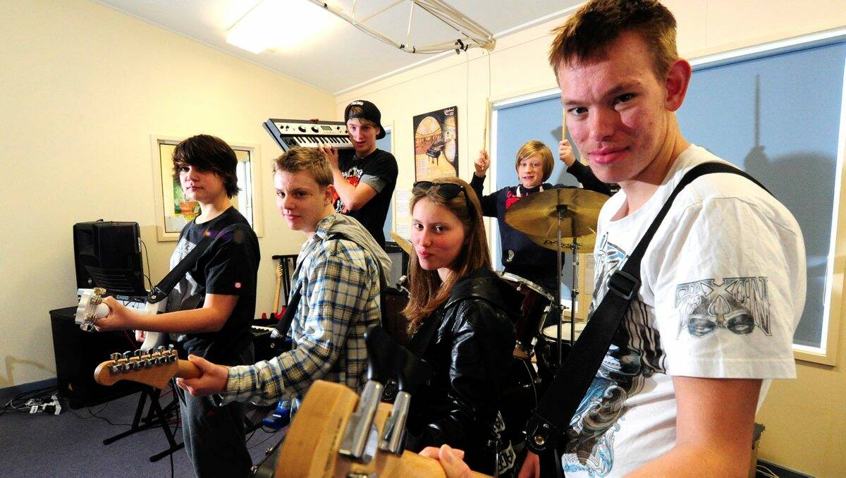 ROCK ON: Ballarat Specialist School’s Thursday Band members, front from left; Luke Berry, Jordan Ward-O’Brien, Tia Lee and Steven Robinson, back; Dean Maguire and Bailey Geary. PICTURE: JEREMY BANNISTER