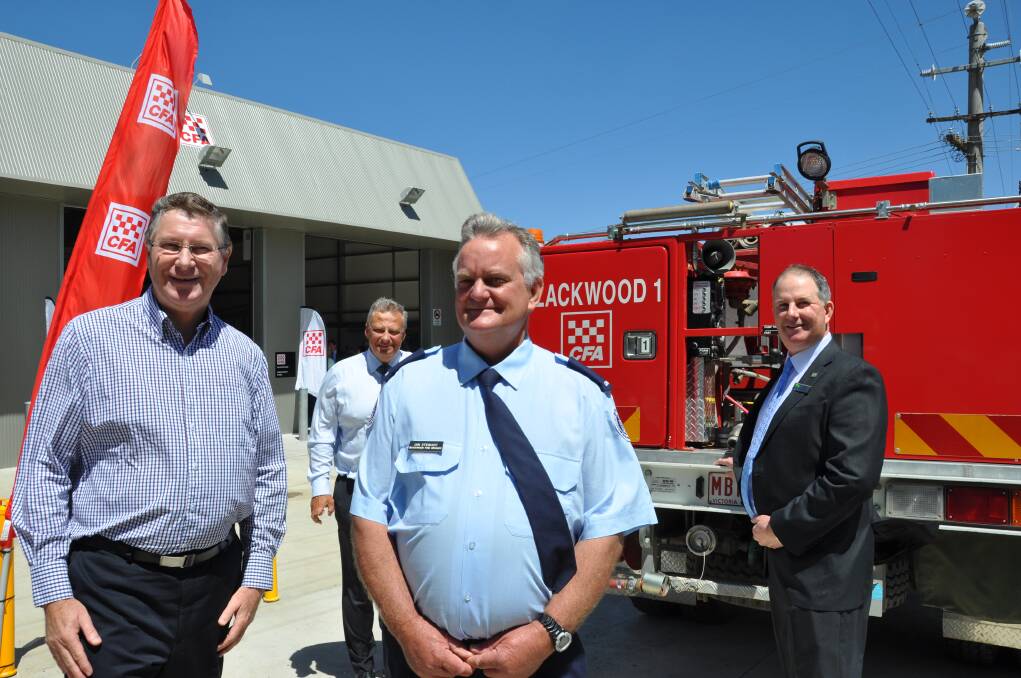 Premier Denis Napthine, Police and Emergency Services Minister Kim Wells, Blackwood Fire Brigade captain Ian Stewart and Moorabool Shire councillor Pat Toohey at the opening of the Blackwood community fire refuge.
