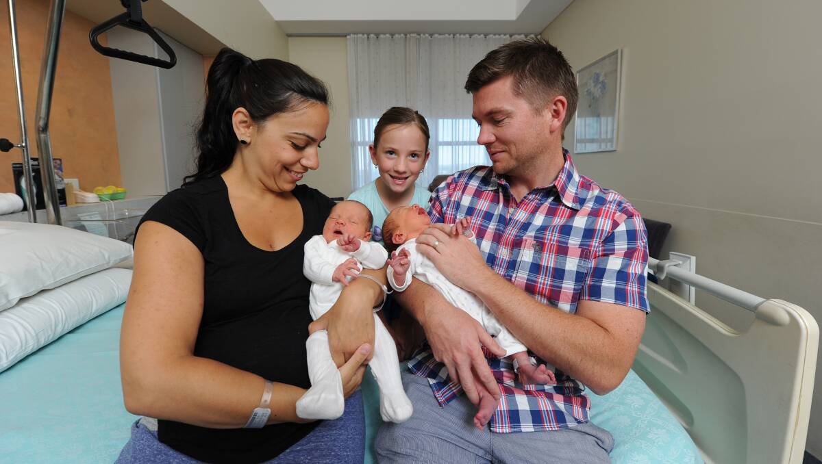 Lisa, Ruby, 6, and Gregg Fowler with their new twins Lenny and Lewis. PICTURE: JUSTIN WHITELOCK