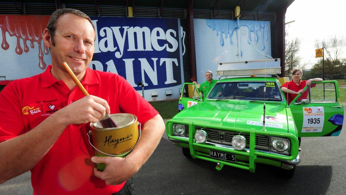 REVVED UP: The Haymes team captain Chris Stevens with fellow co-drivers Russell Hose and Diana Sullivan are ready to hit the road in their Green Machine for the Variety Bash. PICTURE: JEREMY BANNISTER