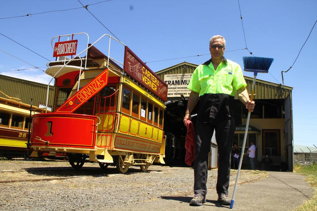 Volunteer co-ordinator Geoff Gardner with the 1887 horse tram. 