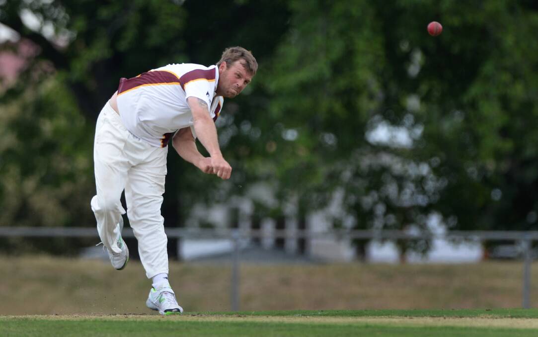 Brown Hill’s Shane Harwood sends a delivery down against his East Ballarat opponent. 